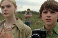 Elle Fanning and Joel Courtney as Joe Lamb in "Super 8."