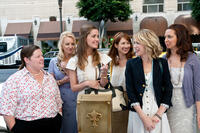 Melissa McCarthy as Megan, Wendi McLendon-Covey as Rita, Rose Byrne as Helen, Ellie Kemper as Becca, Kristen Wiig as Annie and Maya Rudolph as Lillian in ``Bridesmaids.''