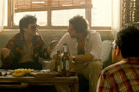 Ken Jeong as Mr. Chow, Bradley Cooper as Phil and Ed Helms as Stu in ``The Hangover Part II.''