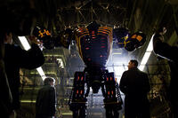 Dakota Goyo as Max, Noisy Boy and Hugh Jackman as Charlie Kenton in ``Real Steel.''