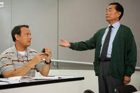 Tom Hanks as Larry Crowne and George Takei as Dr. Matsutani in ``Larry Crowne.''
