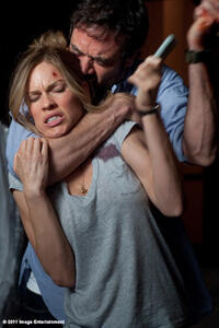 Hilary Swank as Juliet Devereau and Jeffrey Dean Morgan as Max in ``The Resident.''