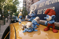 Smurfette Smurf, Brainy Smurf, Grouchy Smurf, Gutsy Smurf and Papa Smurf in ``The Smurfs.''