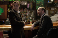Ryan Gosling as Stephen Myers and Paul Giamatti as Tom Duffy in "The Ides of March.''