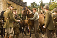 Tom Hiddleston as Captain Nicholls, Geoff Bell as Sergeant Perkins, Joey, Jeremy Irvine as Albert and Peter Mullan as Ted Narracott in ``War Horse.''