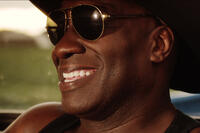 Michael Clarke Duncan as Augy in ``Redemption Road.''