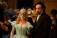Alice Eve as Emily Hamilton and John Cusack as Edgar Allan Poe in ``The Raven.''