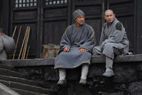 Jackie Chan as Cook and Andy Lau as General Hou Jie in ``Shaolin.''