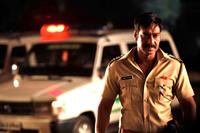 Ajay Devgan as Baji rao singham in ``Singham.''