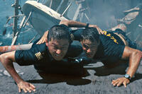 Tadanobu Asano as Nagata and Taylor Kitsch as Alex Hopper in ``Battleship.''
