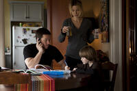 Mark Wahlberg as Chris Farraday, Kate Beckinsale as Kate Farraday and Connor Hill as Michael in ``Contraband.''