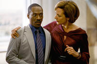 Eddie Murphy as Jack McCall and Allison Janney as Samantha Davis in ``A Thousand Words.''