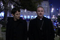 Simon Quarterman as Fr. Ben Rawlings and Evan Helmuth as Fr. David Keane in ``The Devil Inside.''