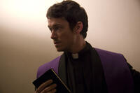 Simon Quarterman as Fr. Ben Rawlings in ``The Devil Inside.''