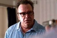 Tom Arnold as Tom Lipnity in ``Restitution.''