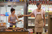 Anna Faris as Zoey and Sacha Baron Cohen as General Aladeen in ``The Dictator.''