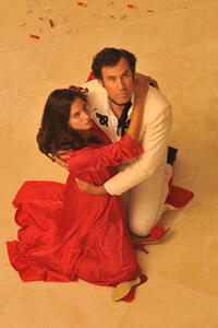 Genesis Rodriguez as Sonia and Will Ferrell as Armando in ``Casa de mi Padre.''