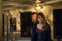 Dennis Quaid as Ely and Aimee Teegarden as Abby in ``Beneath the Darkness.''
