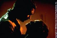 Clark Gable as Rhett Butler and Vivien Leigh as Scarlett O'Hara in ``Gone with the Wind.''