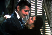 Clark Gable as Rhett Butler and Vivien Leigh as Scarlett O'Hara in ``Gone with the Wind.''