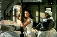 Vivien Leigh as Scarlett O'Hara and Hattie McDaniel as Mammy in ``Gone with the Wind.''