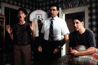 Jason Biggs as Jim, Molly Cheek as Momand Eugene Levy as Dad in "American Pie."