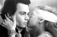 Johnny Depp as Ichabod Crane and Christina Ricci as Katrina Van Tassel  in ``Sleepy Hollow.''