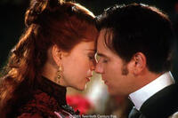 Satine (Nicole Kidman), "The Sparkling Diamond" and Christian (Ewan McGregor), a young poet who arrives in Paris to become a writer, fall deeply in love at the Moulin Rouge.