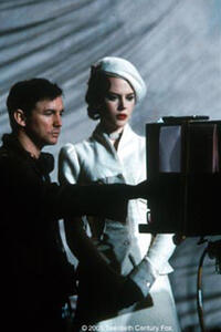 Director Baz Luhrmann and star Nicole Kidman view a playback on the video monitor.