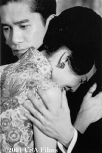 Mo-wan comforts Li-zhen in the Wong Kar-Wai film In the Mood for Love.