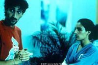 SAM and MAYA (ADRIEN BRODY and PILAR PADILLA).