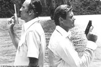 Christopher Lee and Roger Moore in "The Man with the Golden Gun."