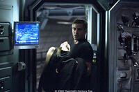 Kelvin (George Clooney) takes desperate measures following the sudden appearance of his wife Rheya (Natascha McElhone).