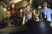 Crew and passengers of "Serenity", a transport-for-hire ship caught between warring forces out to dominate the galaxy.