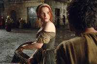 A Plum Girl (Karoline Herfurth) is startled by the attentions of Jean-Baptiste Grenouille (Ben Whishaw) in "Perfume: The Story of a Murderer."