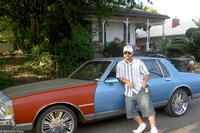 "Hustle & Flow" writer-director Craig Brewer on location in Memphis with DJay's ride.