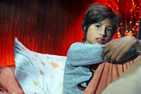 Malcolm Stumpf as Logan in "Wild Tigers I Have Known."