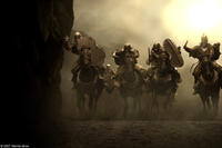 Black Persian battle stallions and their riders emerge from the dusty horizon and thunder down upon the Spartan line in "300."