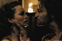 Theron (Dominic West) threatens Gorgo (Lena Headey) when she attempts to secure his support in the Spartan council in "300."