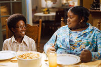 Nine-year-old Norbit (Austin Reid) and a 10-year-old Rasputia (Lindsey Sims-Lewis) share a meal in "Norbit."