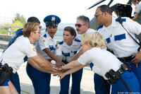 The Reno Sheriffs pump themselves up as they get ready to rid Miami of criminal activity in "Reno 911!: Miami."