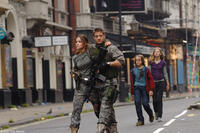Rose Byrne, Jeremy Renner, Mackintosh Muggleton and Imogen Poots in "28 Weeks Later."