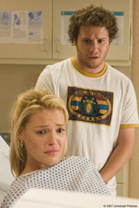 Allison Scott (Katherine Heigl) and Ben Stone (Seth Rogen) learn some interesting news at the OB/GYN in "Knocked Up."