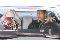 Madison Pettis and The Rock in "The Game Plan."