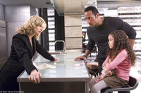 Kyra Sedgwick, The Rock and Madison Pettis in "The Game Plan."