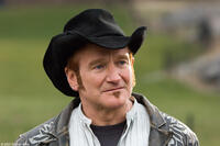 Robin Williams as Maxwell “Wizard” Wallace in "August Rush."