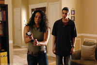Wanda De Jesus and Rick Gonzalez in "Illegal Tender."