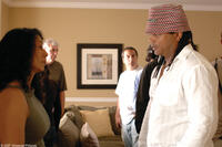 Wanda De Jesus and director Franc Reyes on the set of "Illegal Tender."