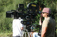 Director Franc Reyes on the set of "Illegal Tender."