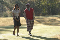 Tamala Jones and Big Boi in "Who's Your Caddy?"